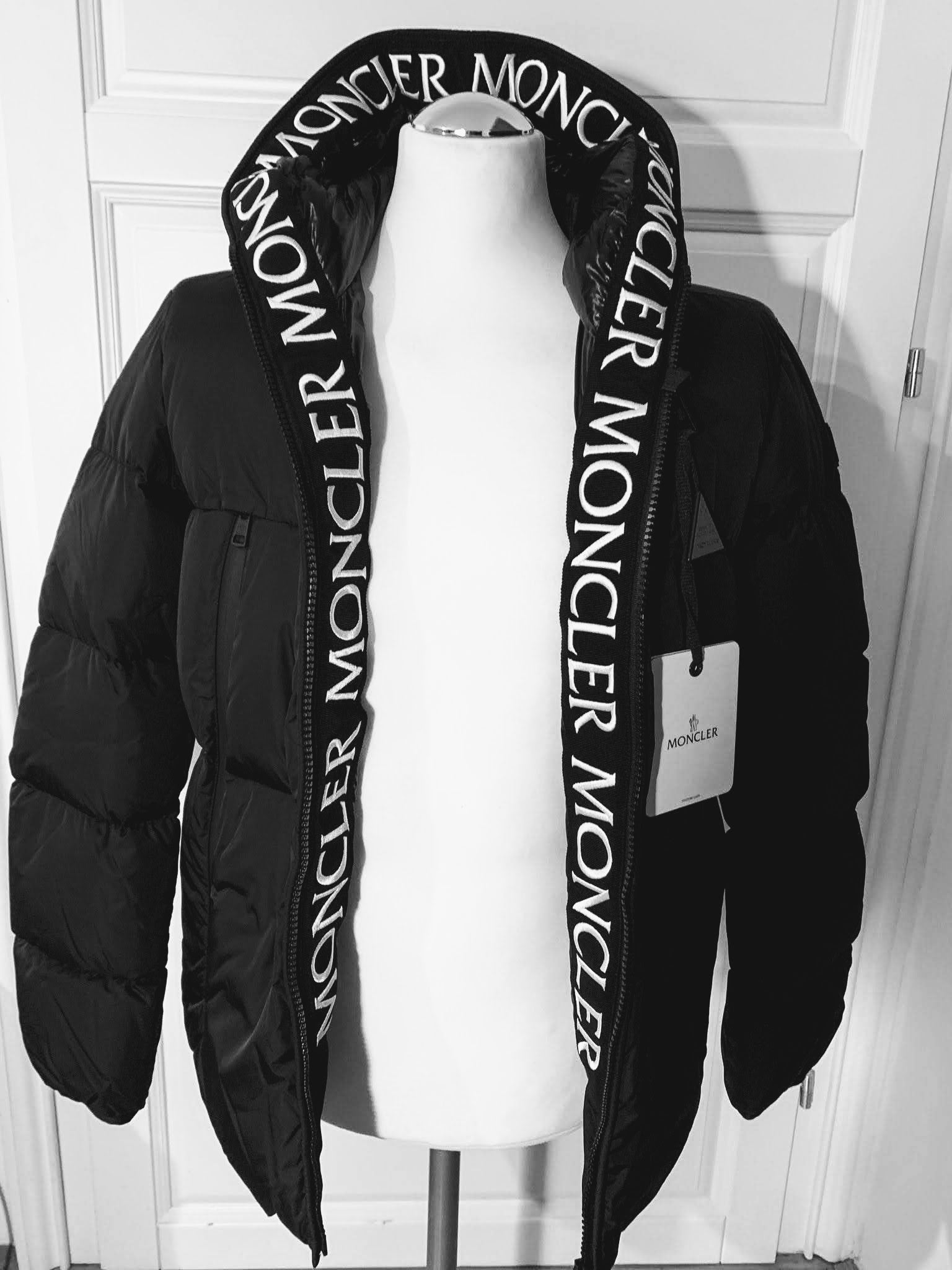 Moncler coat top writing on hood